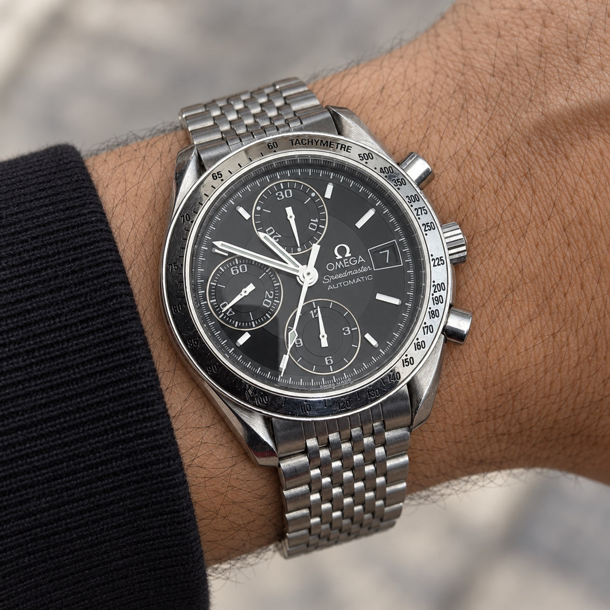 Omega Speedmaster automatic chronograph on wrist