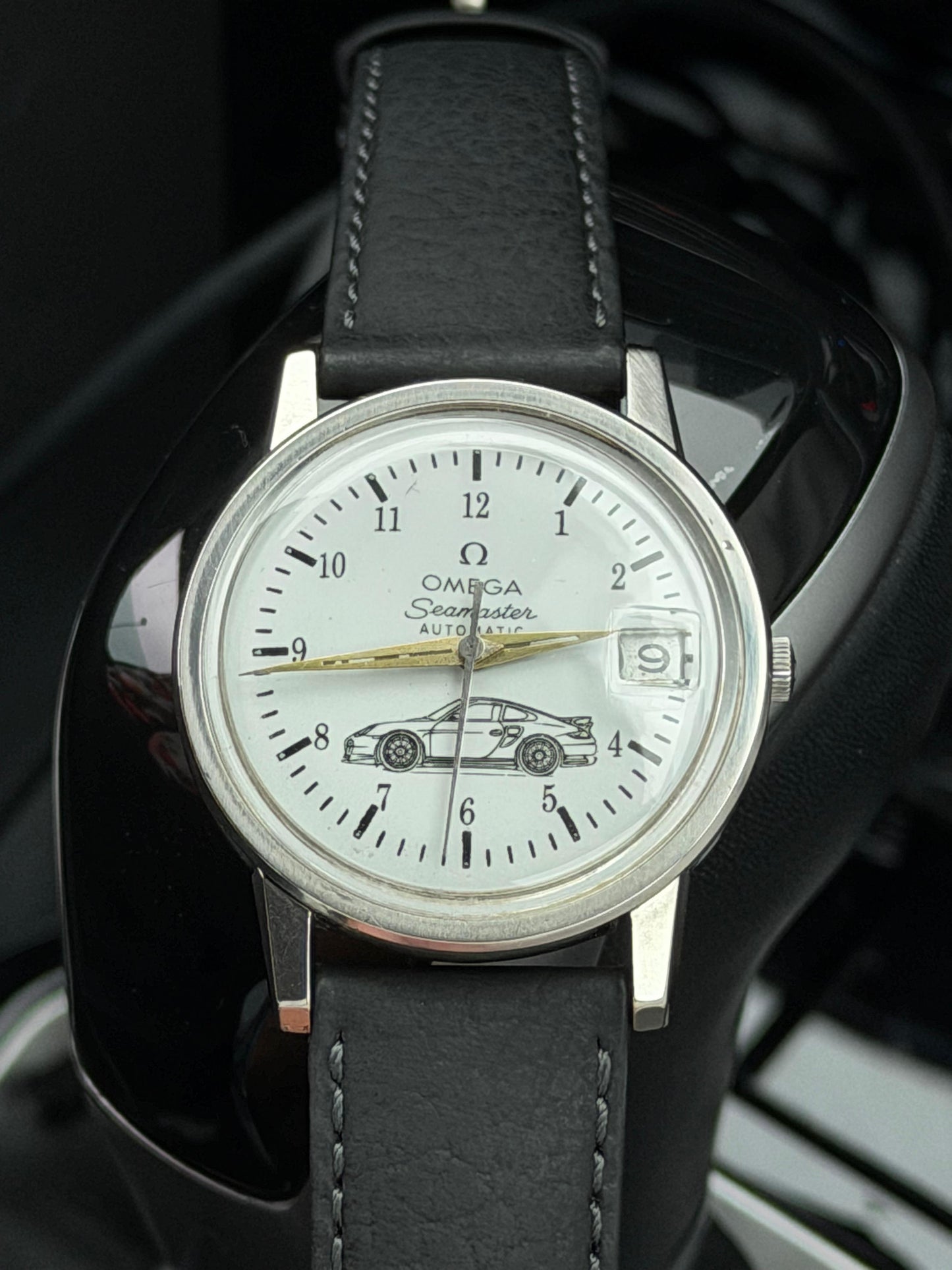 Omega Seamaster White Dial Watch with Gold Hands and Black Strap with Car Motif
