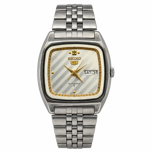 Vintage Seiko 5 silver striped dial rectangular watch on white