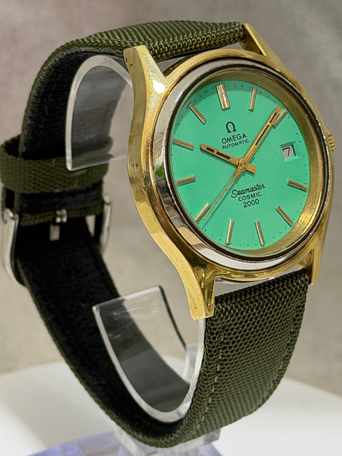 W017 Omega Seamaster Cosmic 2000 Automatic, turquoise-green dial, 38 mm — side view