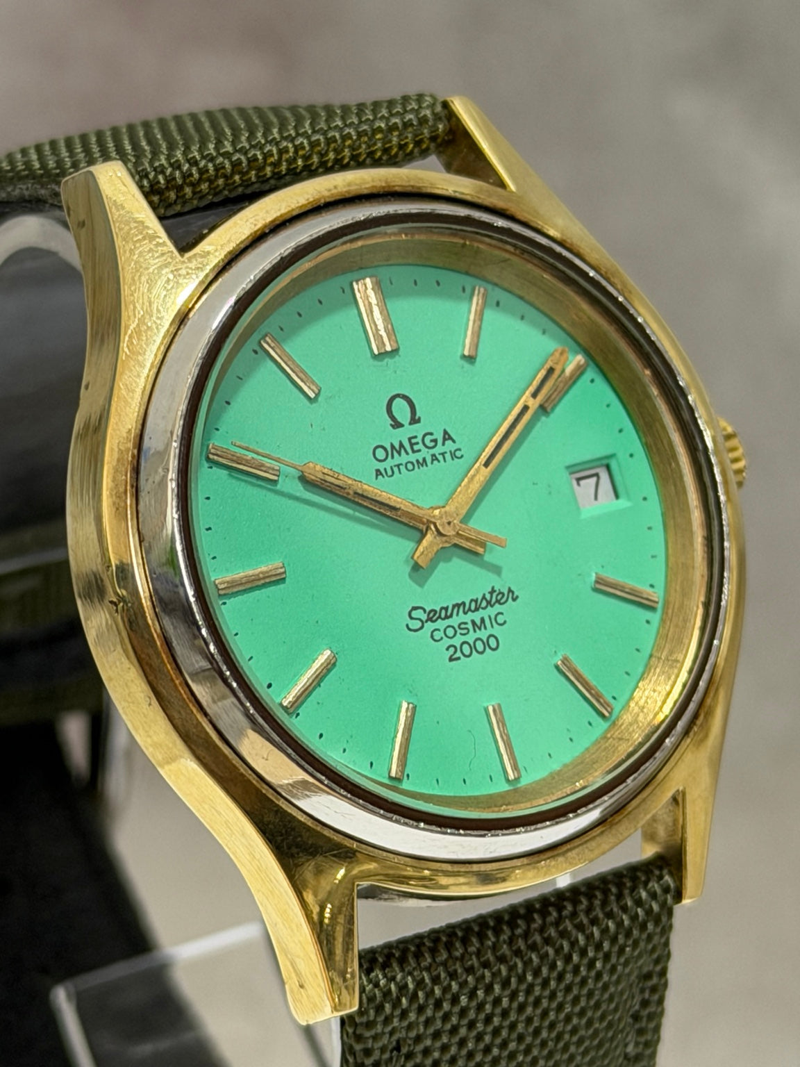 W017 Omega Seamaster Cosmic 2000 Automatic, turquoise-green dial, 38 mm — dial detail