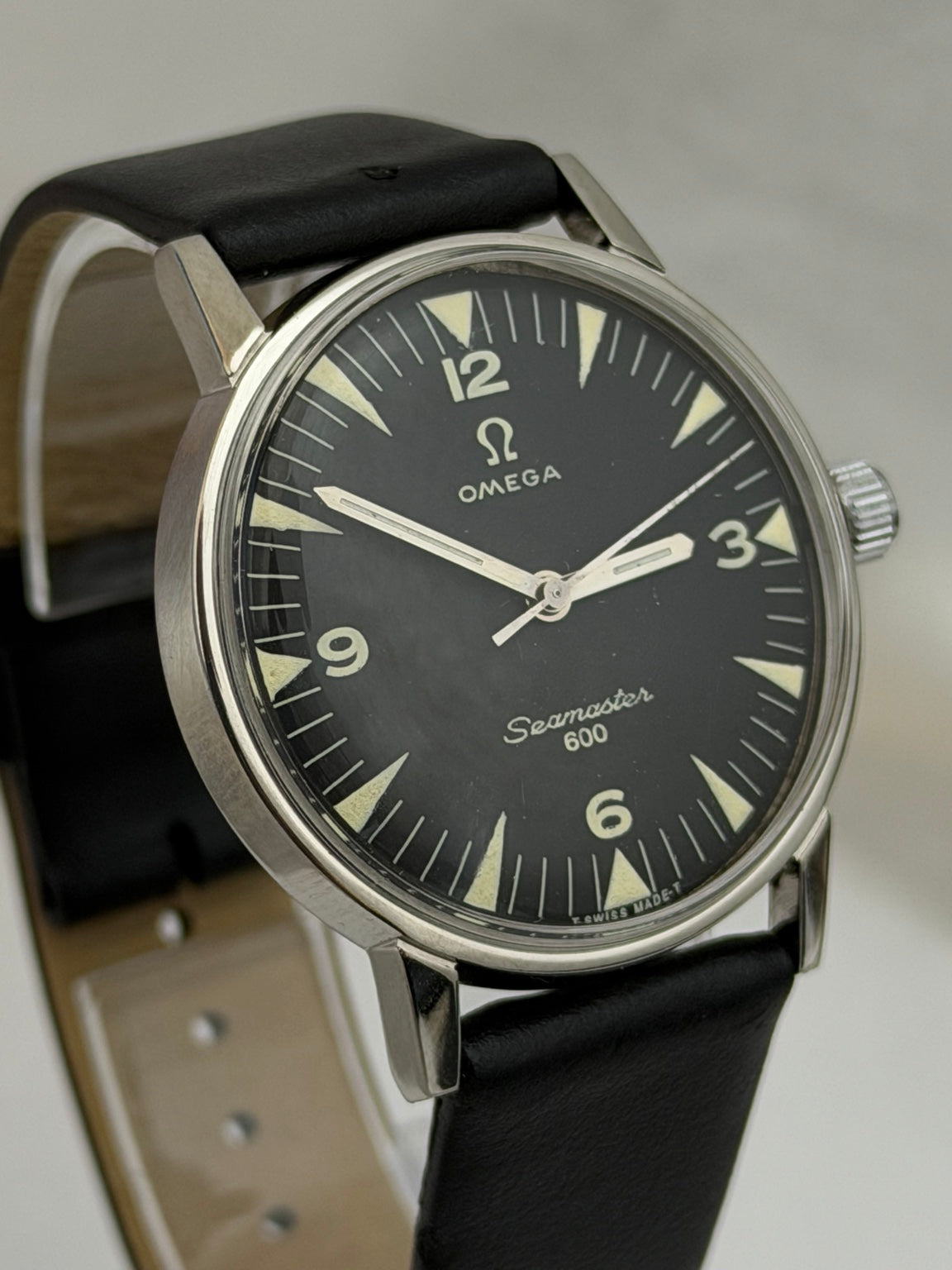 W020 Omega custom-repainted black dial watch – original angled dial photo