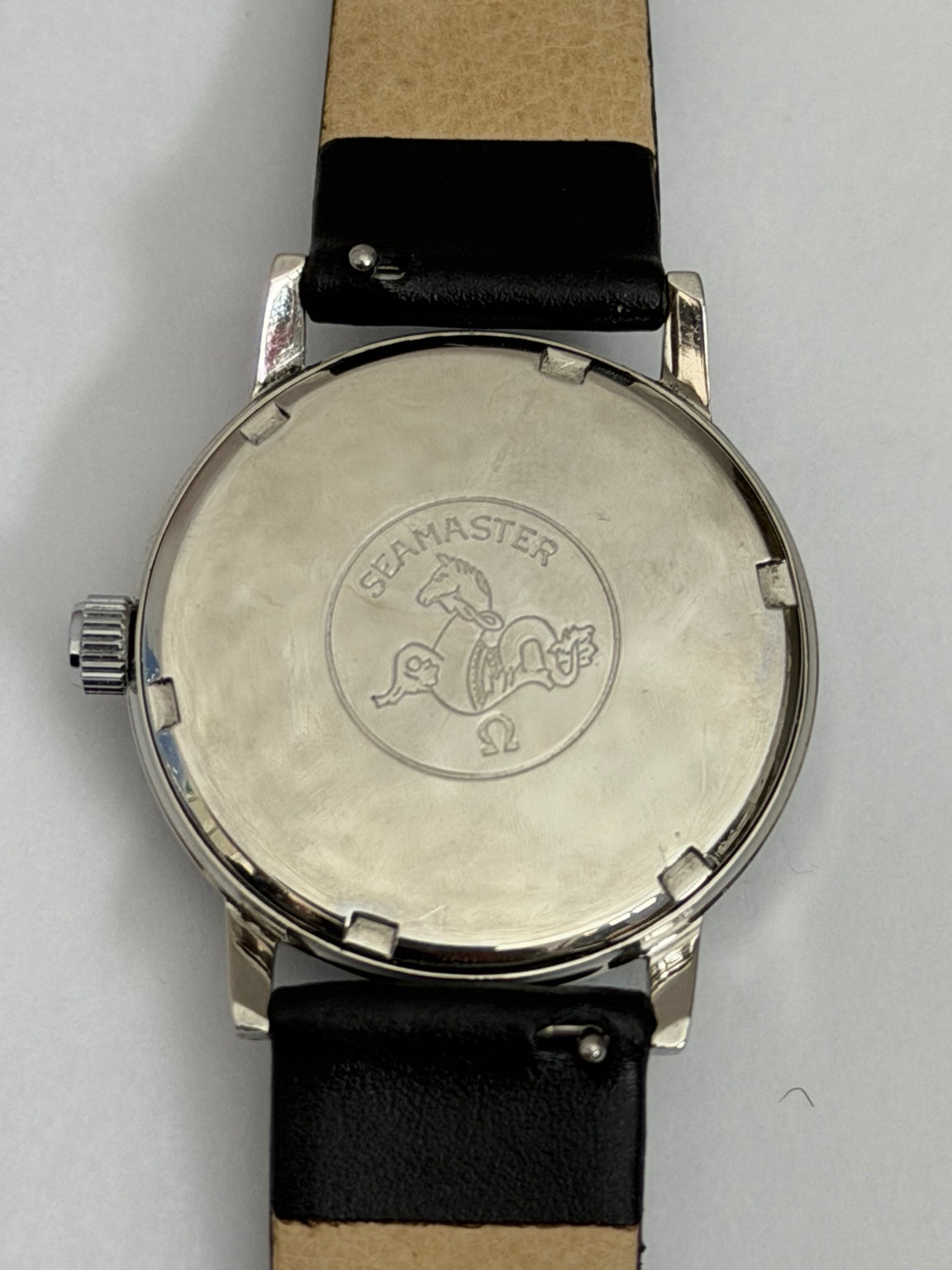 W020 Omega custom-repainted black dial watch – original caseback photo