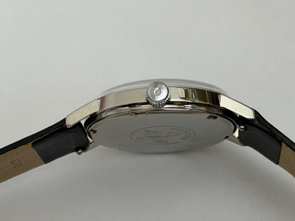 W020 Omega custom-repainted black dial watch – original side profile photo