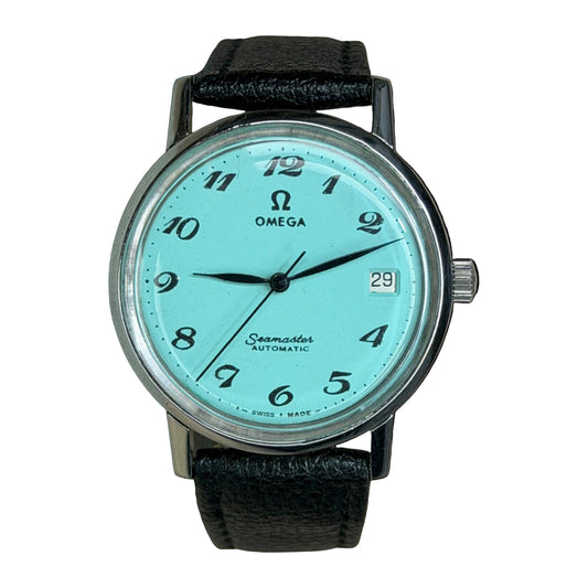 OMEGA Seamaster Automatic – Turquoise Arabic Date Dial on a white background