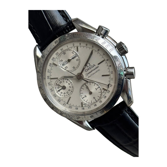 Omega speedmaster automatic triple date — front product photograph on a white background