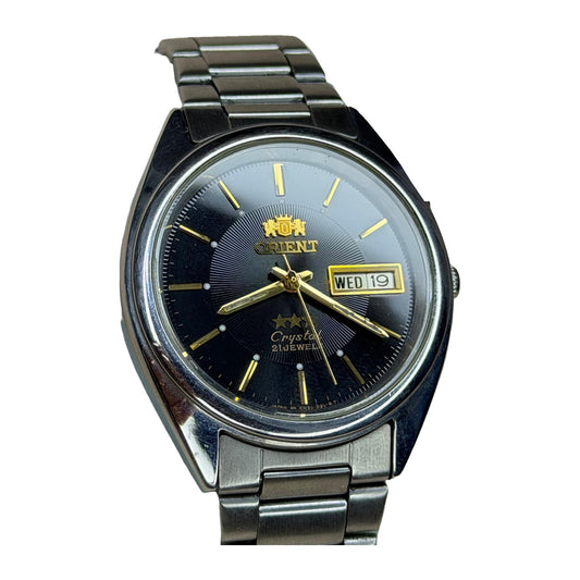 ORIENT – Black Dial, Day-Date, Automatic Wristwatch (Vintage) on a white background
