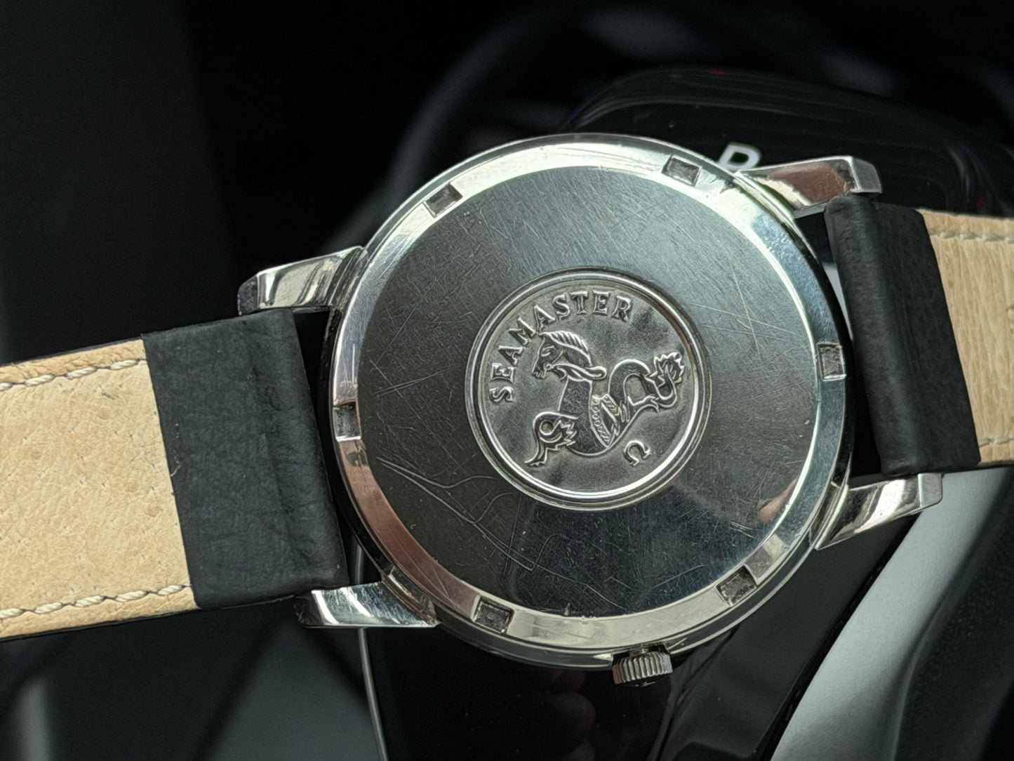 Omega Seamaster White Dial Watch with Gold Hands and Black Strap with Car Motif