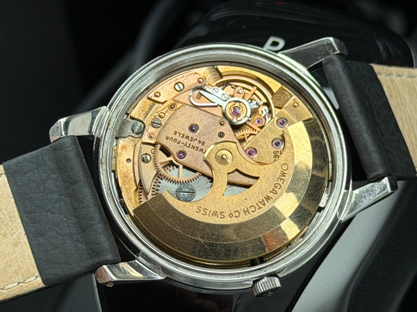 Omega Seamaster White Dial Watch with Gold Hands and Black Strap with Car Motif