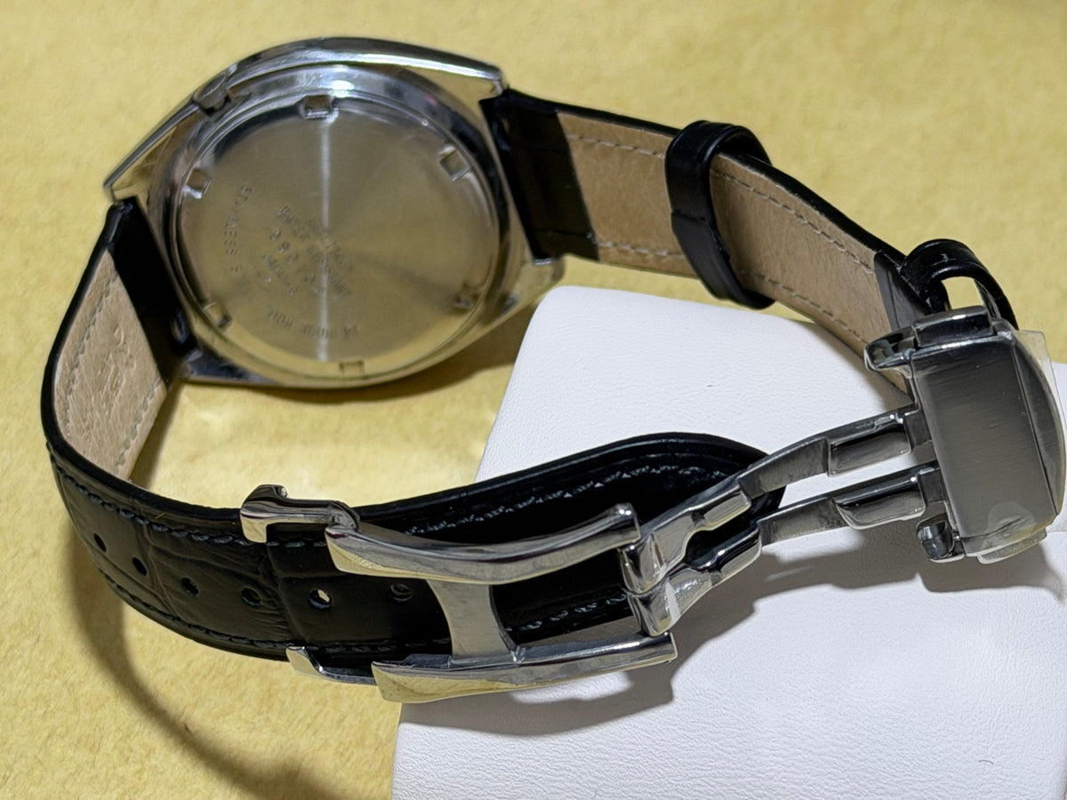 Open folding clasp and underside of watch