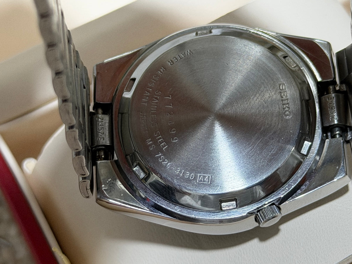 Vintage Seiko 5 stainless steel case back marked 7526-3130