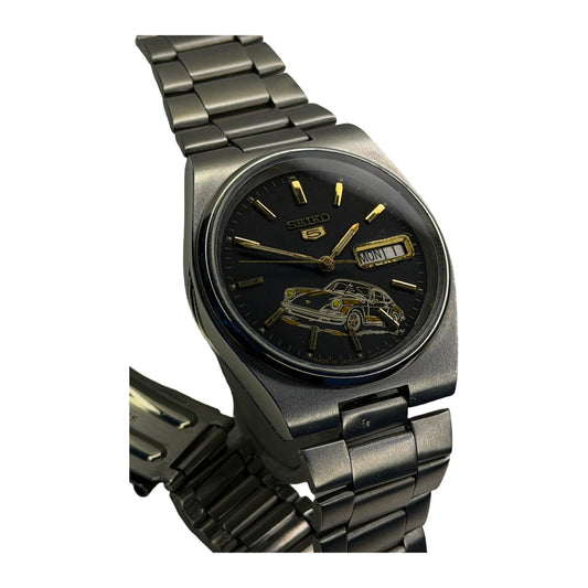 Seiko 5 automatic vintage engraved Porsche. — front product photograph on a white background