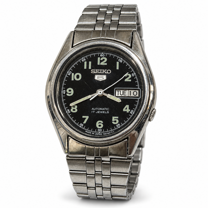 Seiko 5 black Arabic numeral dial automatic watch SK08 on white background