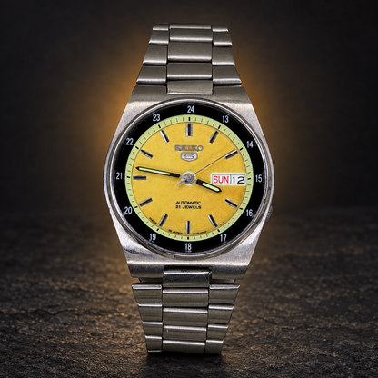 W012 SEIKO 5 – Automatic, Yellow Dial, Day-Date Watch (Vintage) with AI-styled luxury background